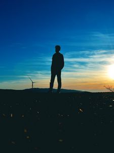 Preview wallpaper man, silhouette, horizon, sunset