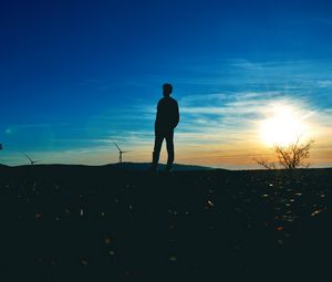 Preview wallpaper man, silhouette, horizon, sunset