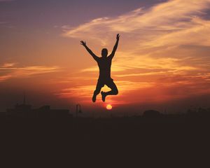 Preview wallpaper man, silhouette, jump, sky, sunset