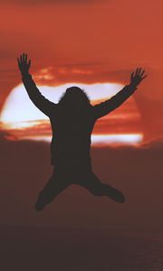 Preview wallpaper man, silhouette, jump, sunset, freedom