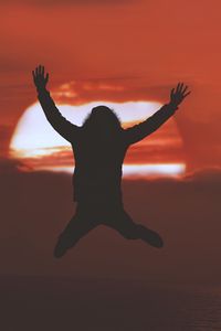 Preview wallpaper man, silhouette, jump, sunset, freedom