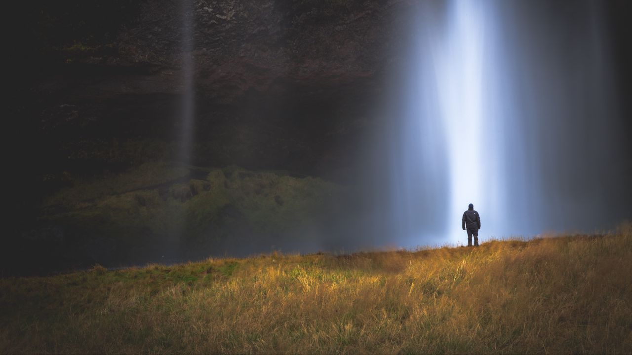 Wallpaper man, silhouette, light, grass, waterfall, alone