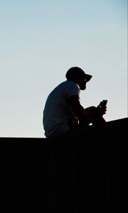 Preview wallpaper man, silhouette, loneliness, sad