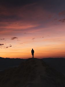 Preview wallpaper man, silhouette, loneliness, dusk, mountains