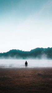 Preview wallpaper man, silhouette, loneliness, steam, lake