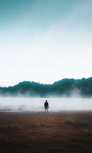 Preview wallpaper man, silhouette, loneliness, steam, lake