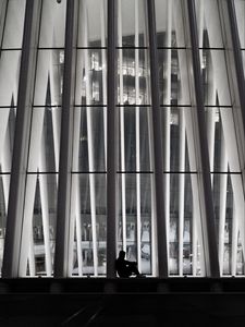 Preview wallpaper man, silhouette, loneliness, windows, building, architecture, bw