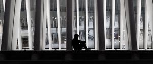 Preview wallpaper man, silhouette, loneliness, windows, building, architecture, bw