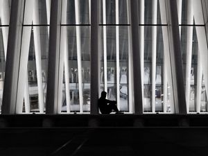 Preview wallpaper man, silhouette, loneliness, windows, building, architecture, bw