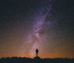 Preview wallpaper man, silhouette, milky way, starry sky, loneliness, night