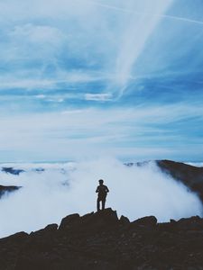 Preview wallpaper man, silhouette, mountains, clouds, top