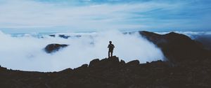 Preview wallpaper man, silhouette, mountains, clouds, top