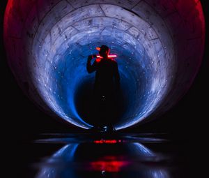 Preview wallpaper man, silhouette, neon, tunnel, dark