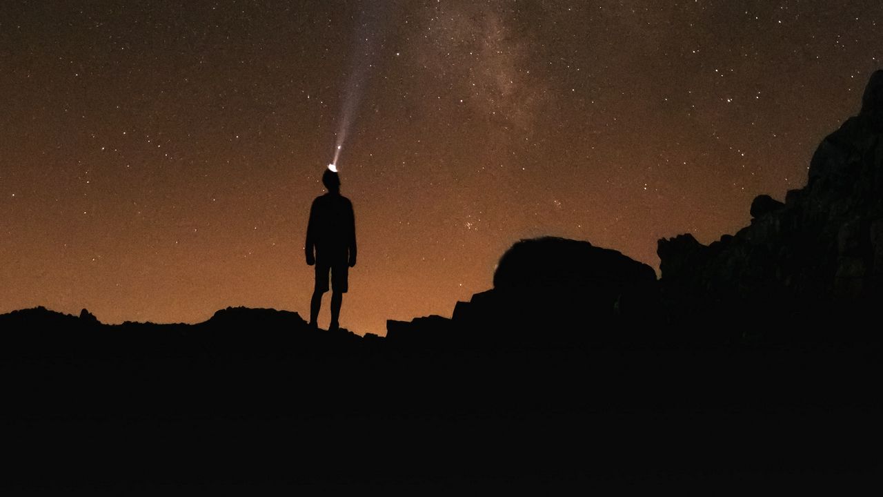 Wallpaper man, silhouette, night, flashlight, starry sky, dark