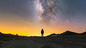 Preview wallpaper man, silhouette, night, milky way, alone