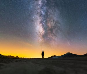 Preview wallpaper man, silhouette, night, milky way, alone