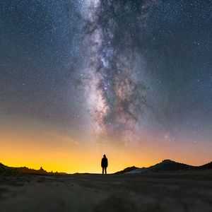 Preview wallpaper man, silhouette, night, milky way, alone