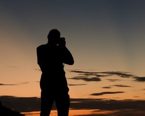 Preview wallpaper man, silhouette, photographer, sunset