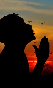 Preview wallpaper man, silhouette, prayer, sky