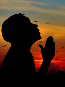 Preview wallpaper man, silhouette, prayer, sky