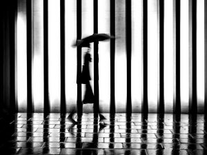 Preview wallpaper man, silhouette, rain, bw, lattice, movement