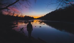 Preview wallpaper man, silhouette, river, trees, sky, solitude, harmony