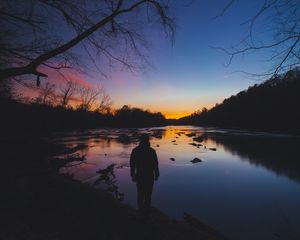 Preview wallpaper man, silhouette, river, trees, sky, solitude, harmony