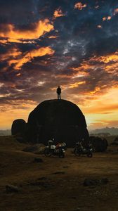 Preview wallpaper man, silhouette, rock, motorcycles, bikes, dark