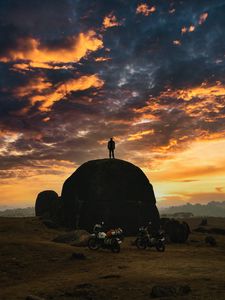 Preview wallpaper man, silhouette, rock, motorcycles, bikes, dark