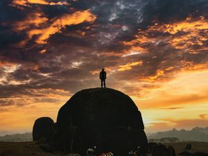 Preview wallpaper man, silhouette, rock, motorcycles, bikes, dark