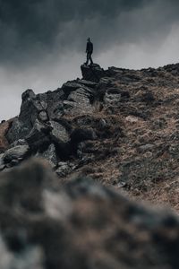 Preview wallpaper man, silhouette, rock, alone