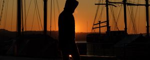 Preview wallpaper man, silhouette, shadow, sunset, dark