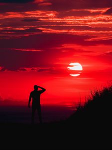 Preview wallpaper man, silhouette, sunset, sky