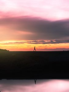 Preview wallpaper man, silhouette, sunset, horizon, reflection