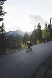 Preview wallpaper man, skate, helmet, slope, mountains