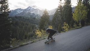 Preview wallpaper man, skate, helmet, slope, mountains