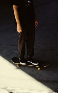 Preview wallpaper man, skateboard, legs, asphalt, shadow