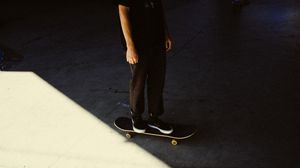 Preview wallpaper man, skateboard, legs, asphalt, shadow