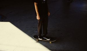 Preview wallpaper man, skateboard, legs, asphalt, shadow