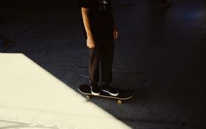 Preview wallpaper man, skateboard, legs, asphalt, shadow