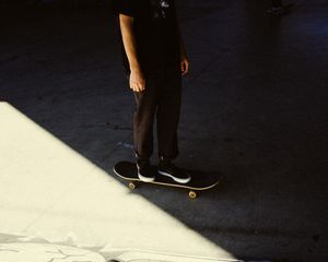 Preview wallpaper man, skateboard, legs, asphalt, shadow