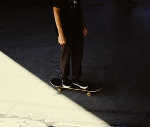 Preview wallpaper man, skateboard, legs, asphalt, shadow