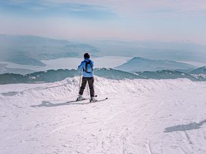 Preview wallpaper man, skiing, mountains, snow, winter, white