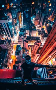 Preview wallpaper man, skyscrapers, night, overview, height