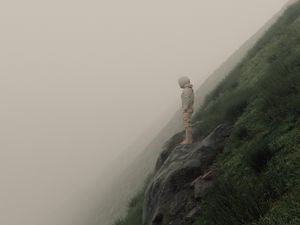 Preview wallpaper man, slope, fog, stones, art