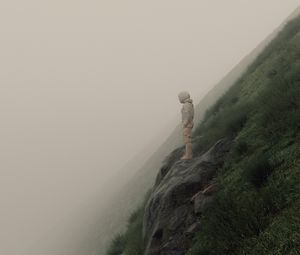 Preview wallpaper man, slope, fog, stones, art