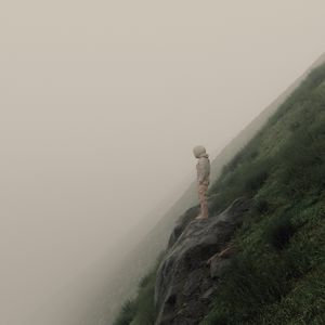 Preview wallpaper man, slope, fog, stones, art