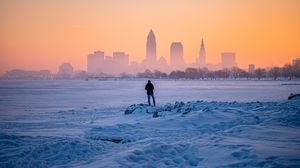 Preview wallpaper man, snow, loneliness, city, winter