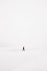 Preview wallpaper man, snow, minimalism, bw, loneliness