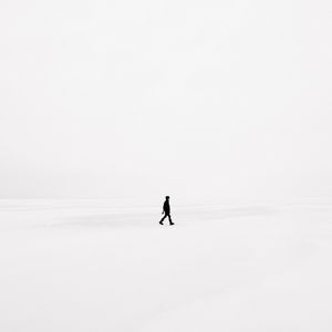 Preview wallpaper man, snow, minimalism, bw, loneliness